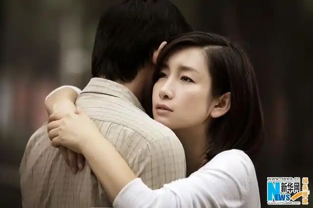 秦海璐陆毅"牵手"照曝光 《假如》收视飘红(图)